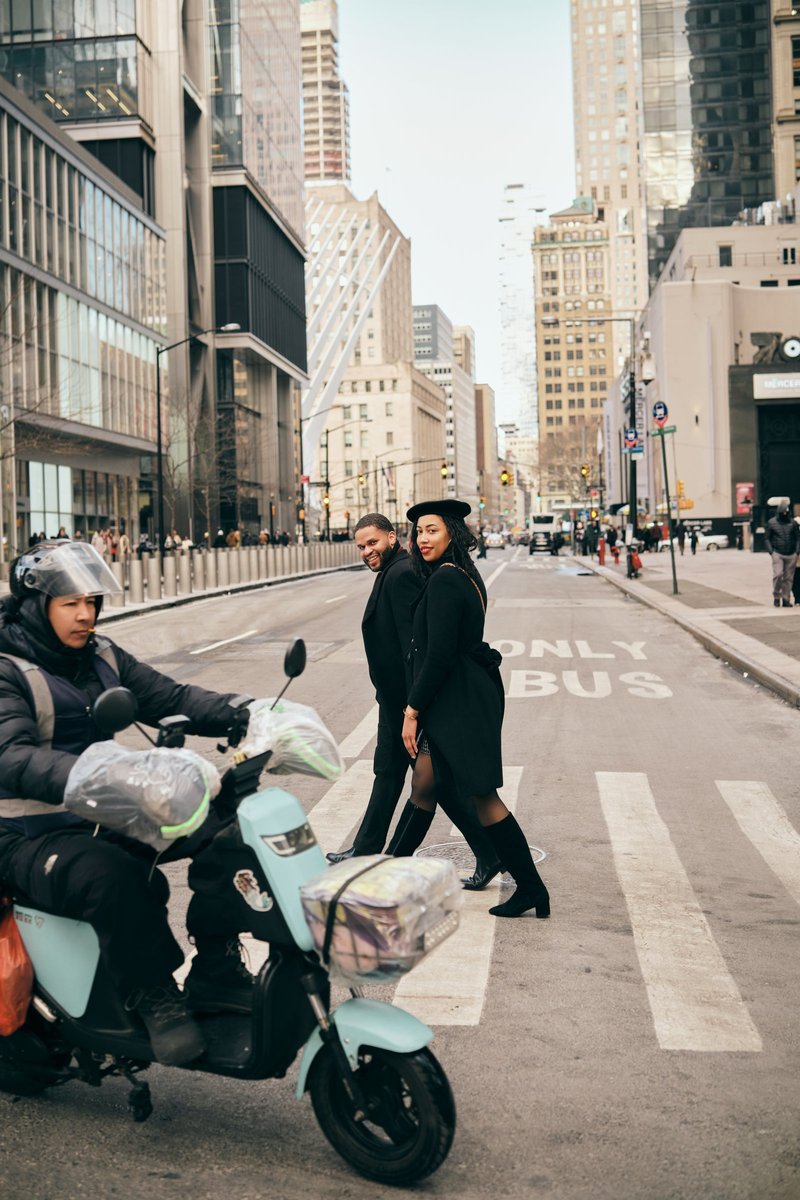 Couple Crossing a Manhattan Avenue in Winter