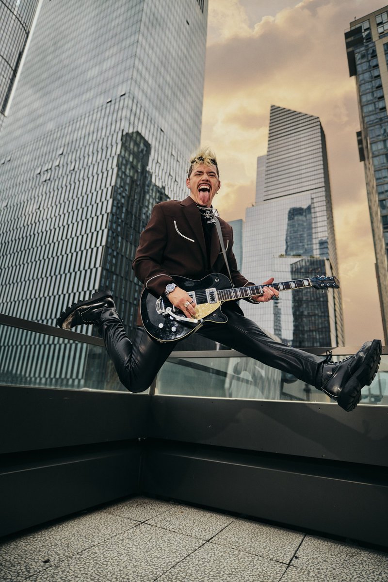 Guitarist Leaping in Front of Hudson Yards Towers
