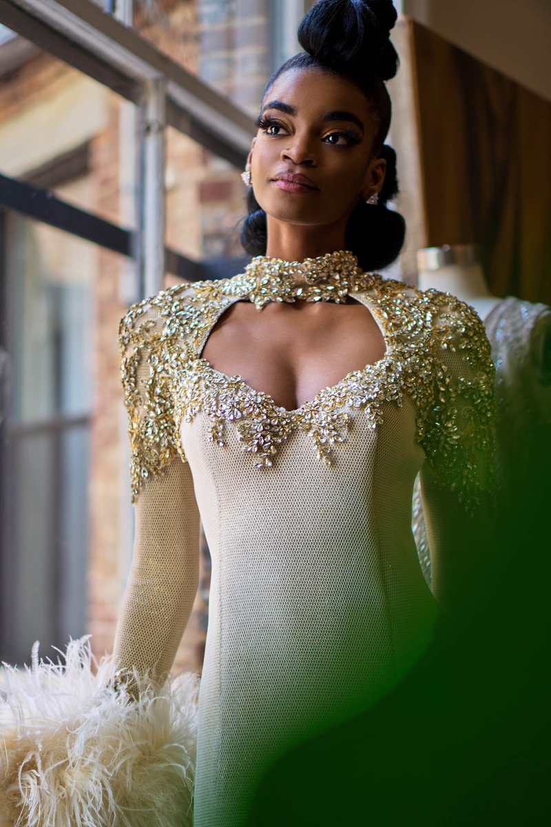 Bride in a Gold-Embellished Gown by a Window