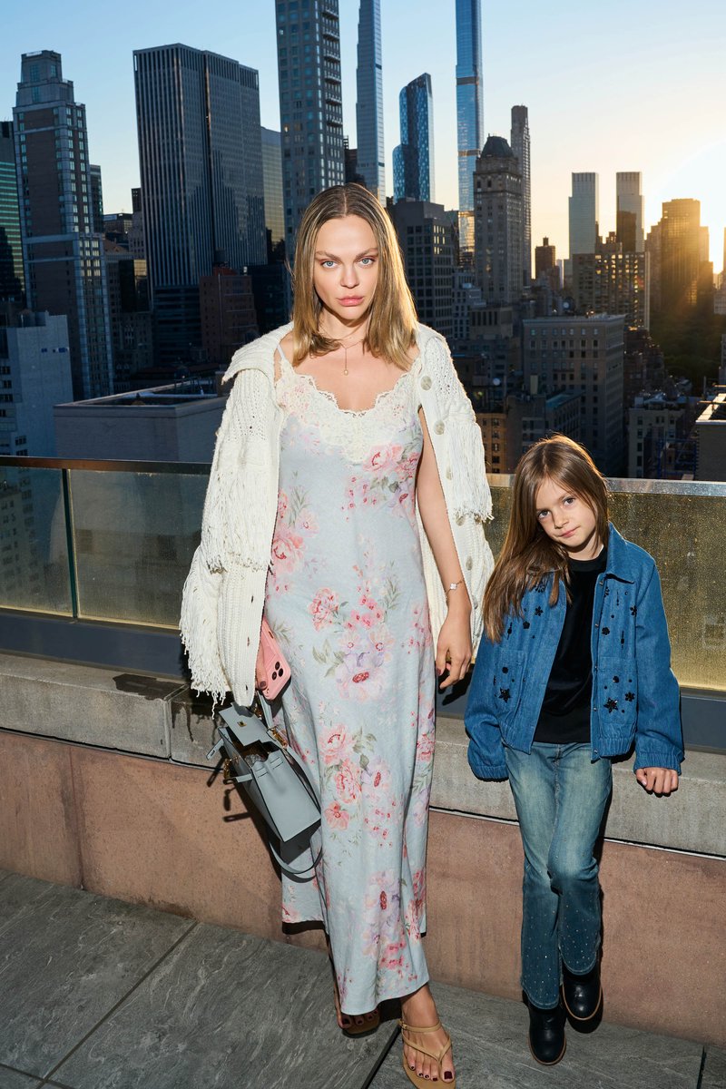 Mother and Daughter on a Rooftop at Sunset in Manhattan