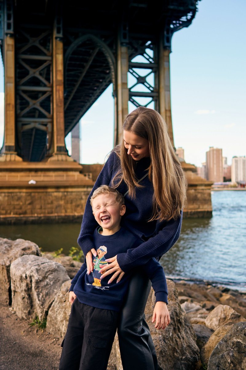 Mother and Son Laughing Under the Manhattan Bridge