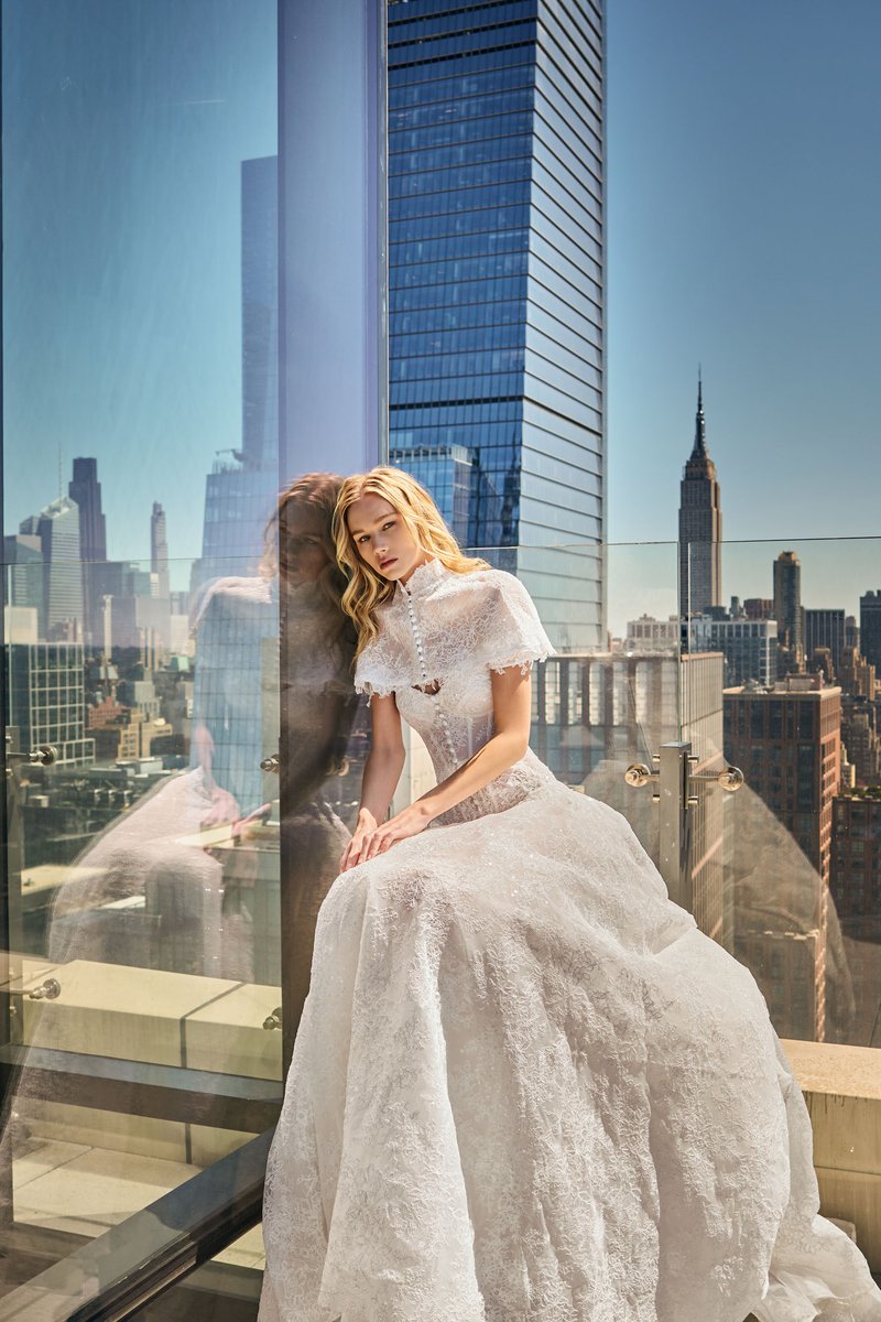 Bride by a Glass Wall with the Empire State Building Behind