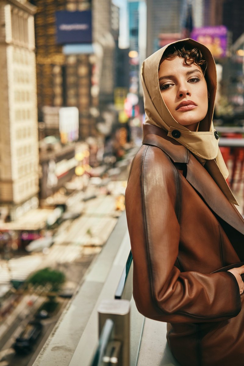 Model in Leather on a Balcony Above Times Square