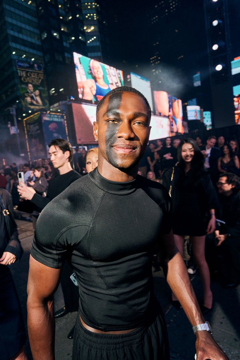Guest at an Outdoor Evening Event in Times Square