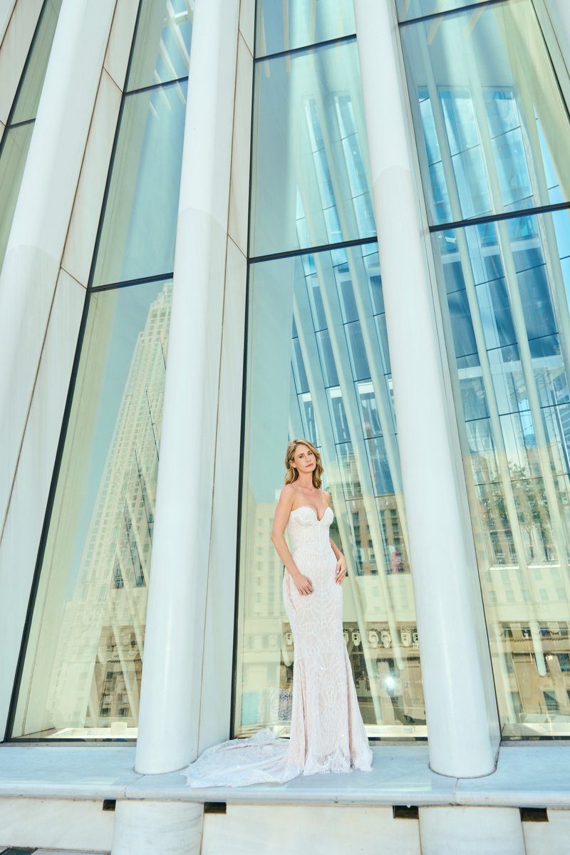 Bride Between White Columns of a Modern NYC Building