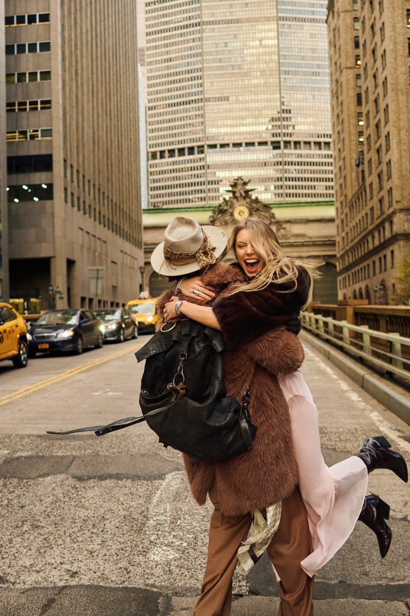 Couple Embracing by Grand Central Terminal