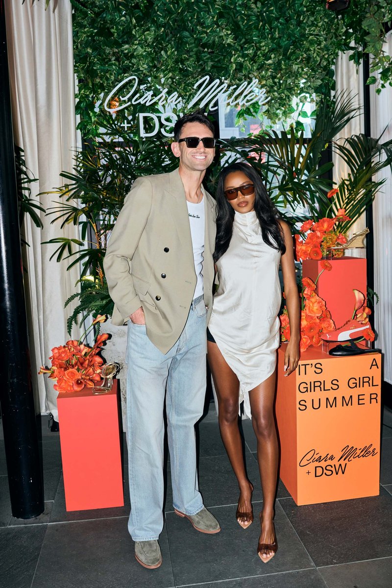 Couple at a Brand Launch Photo Backdrop