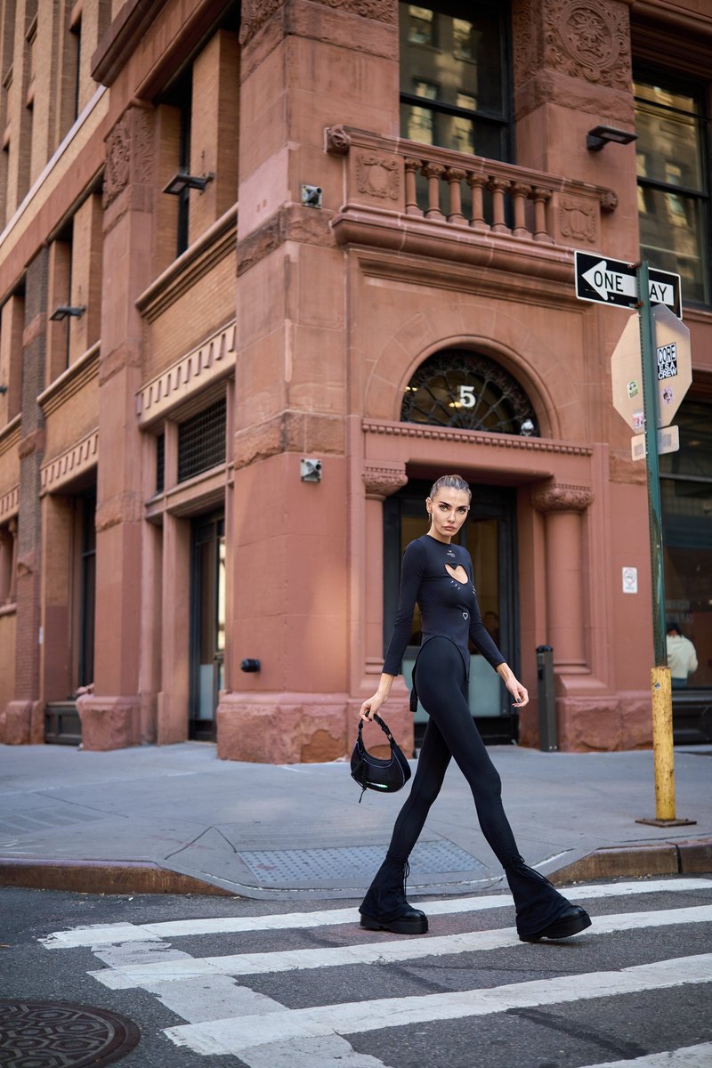 Model Crossing a Street by a Tribeca Brownstone