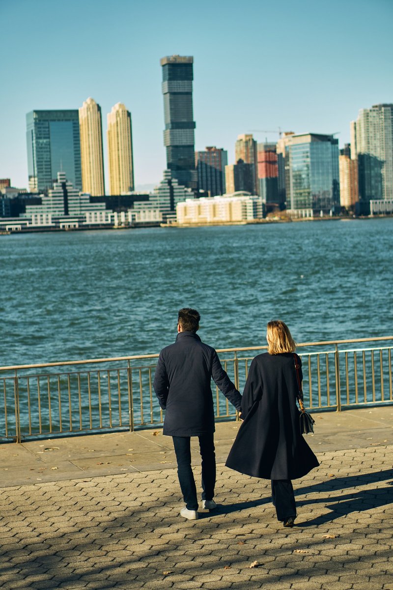 Couple Holding Hands by the Hudson River
