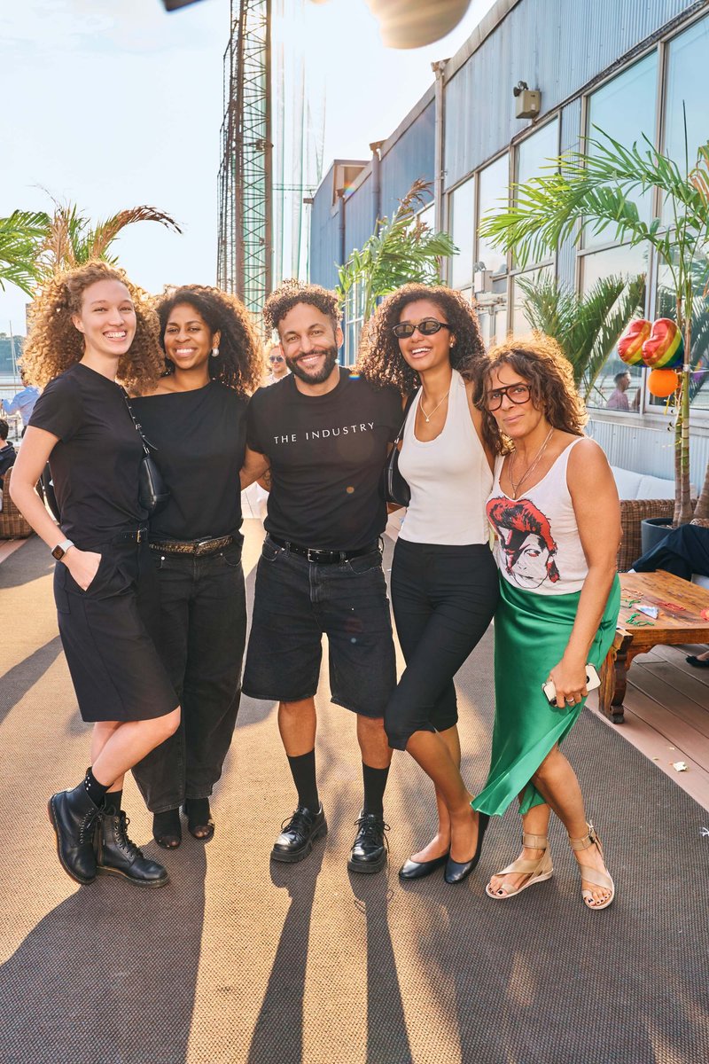 Team Portrait at a Waterfront Pier Party