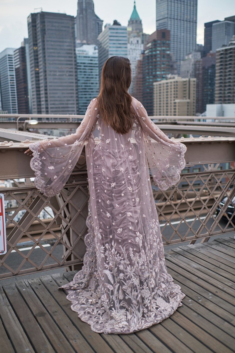 Model in an Embroidered Cape on the Brooklyn Bridge